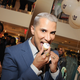Illustration for article titled Jay Manuel Pretends to Eat a Mini Cupcake at Lane Bryant Opening